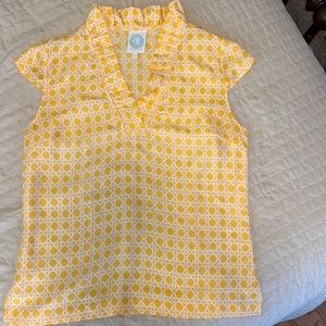 Silk blouse in yellow geo print.
